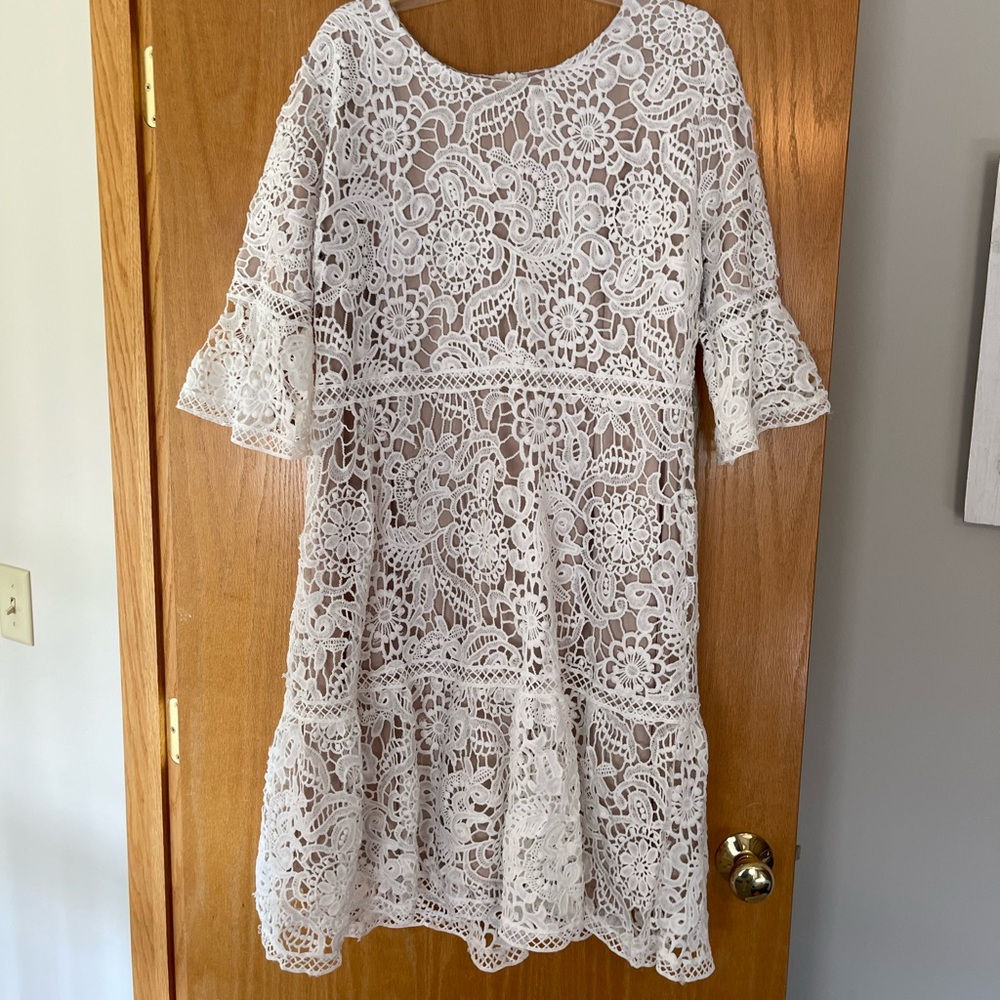 White and nude lace dress.